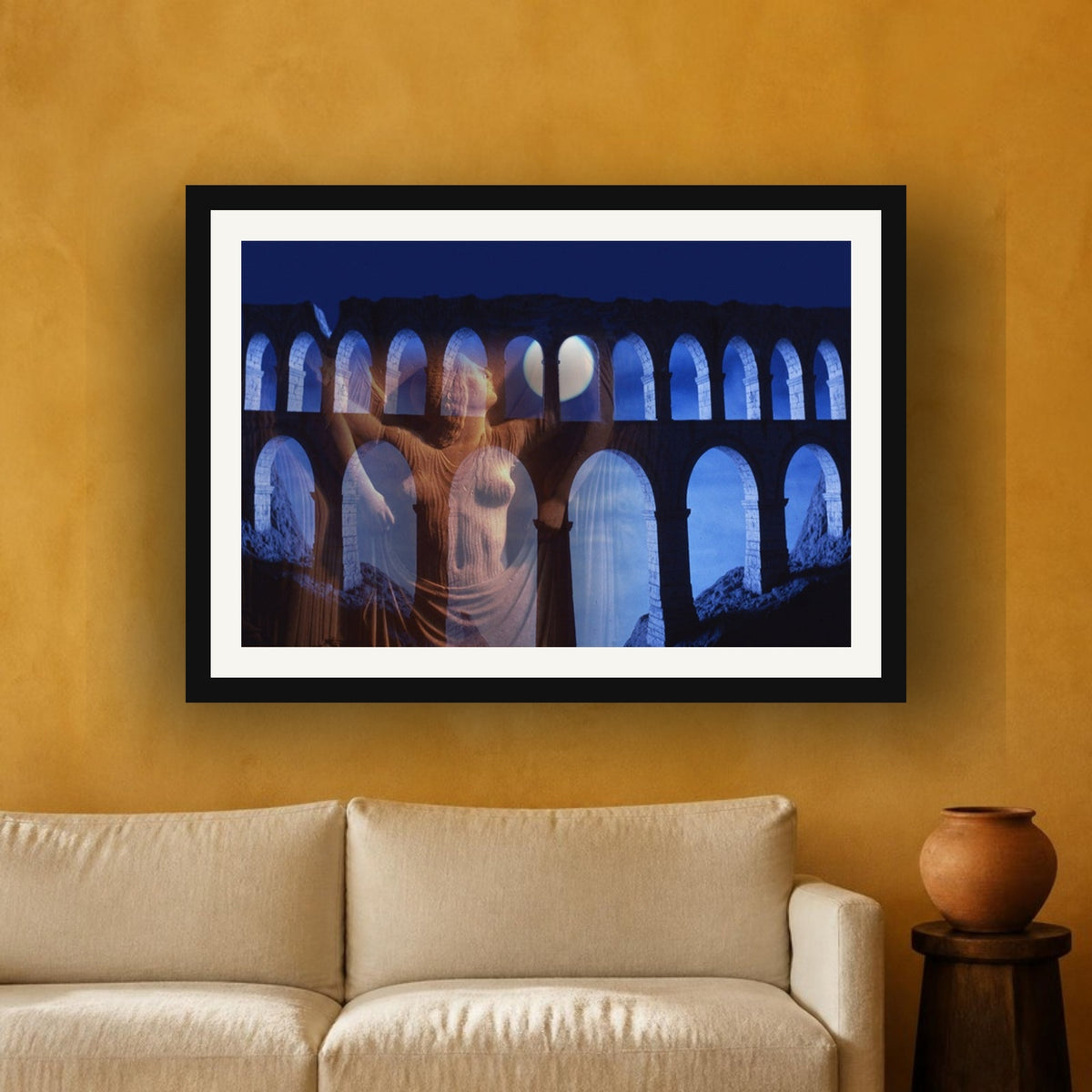 The Aqueduct & His Goddess framed photo print by Vittorio Storaro on an ochre plaster wall
