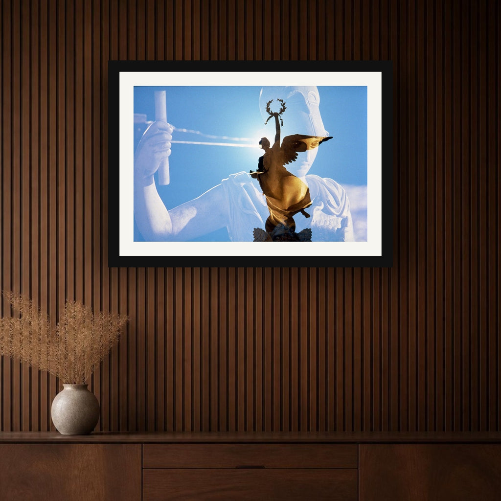 The Victory framed photo print by Vittorio Storaro on a walnut panelled wall