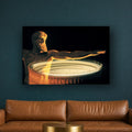 The Colosseum canvas print by Vittorio Storaro on a deep teal wall