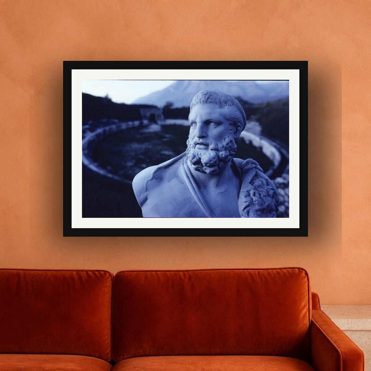 Eracle framed photo print by Vittorio Storaro on a peach plaster wall