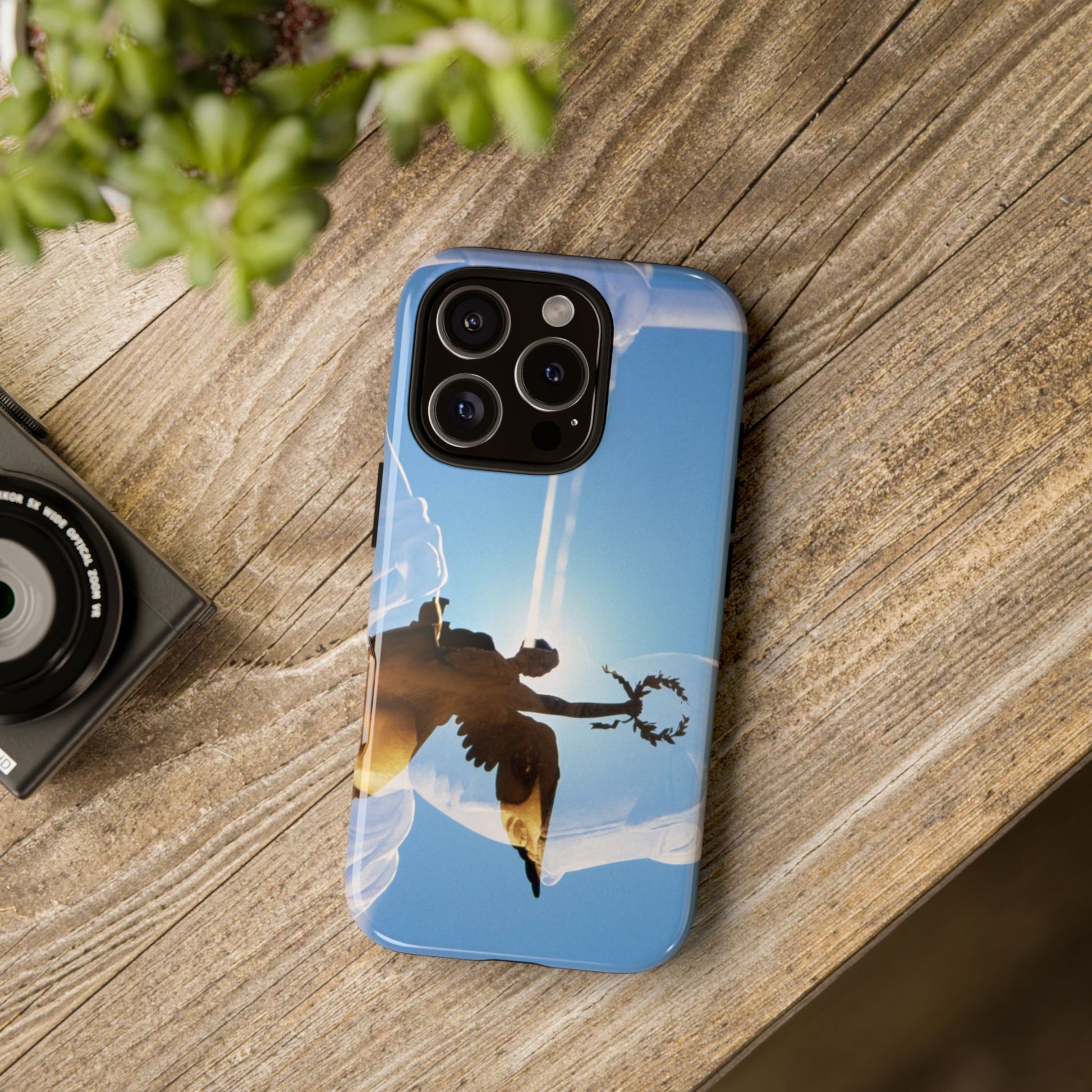 The Victory tough phone case by Vittorio Storaro, from the La Civiltà Romana collection, shown on a table