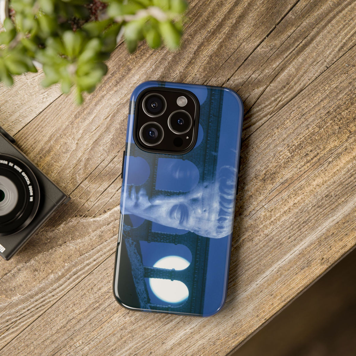 Claudius Aqueduct tough phone case by Vittorio Storaro, from the La Civiltà Romana collection, shown on a table