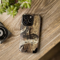 The Muse of Rome tough phone case by Vittorio Storaro, from the La Civiltà Romana collection, shown on a table