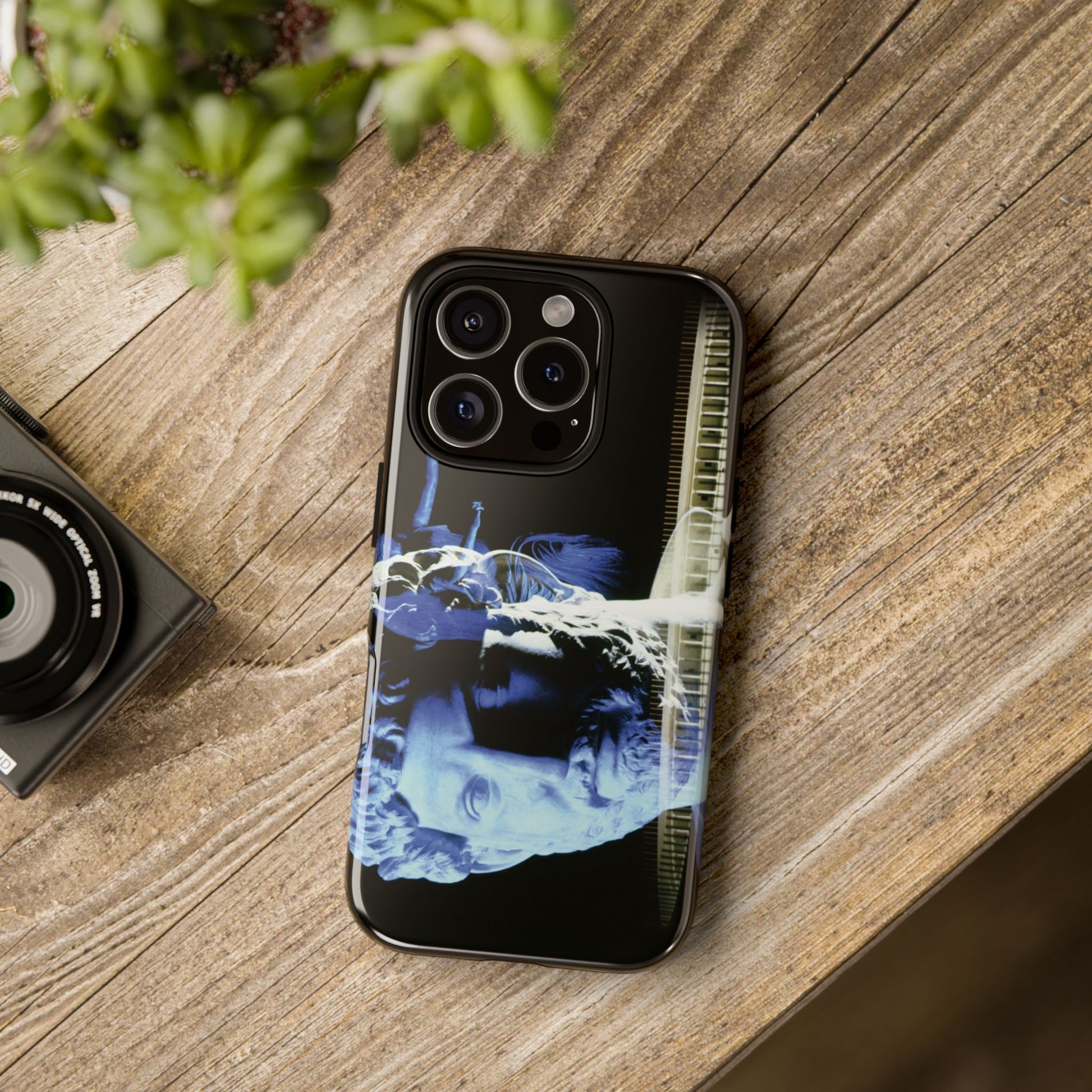 Adriano's goddess Fortuna tough phone case by Vittorio Storaro, from the La Civiltà Romana collection, shown on a table