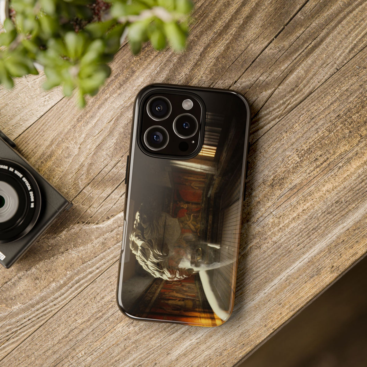 The Villa dei Mysteries tough phone case by Vittorio Storaro, from the La Civiltà Romana collection, shown on a table