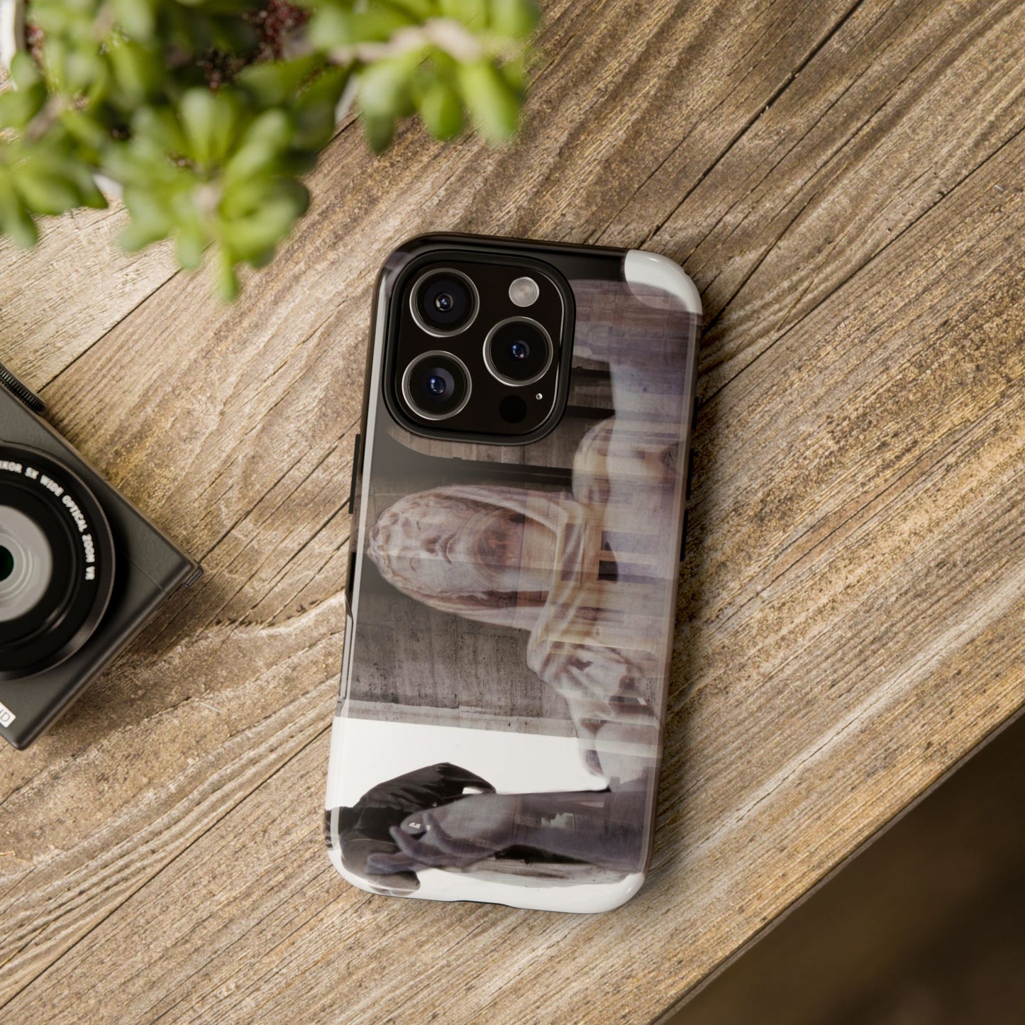 Italic Civilization tough phone case by Vittorio Storaro, from the La Civiltà Romana collection, shown on a table