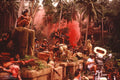 Red smoke over the jungle temple set with extras and the film camera, signed Apocalypse Now behind-the-scenes photo by Vittorio Storaro