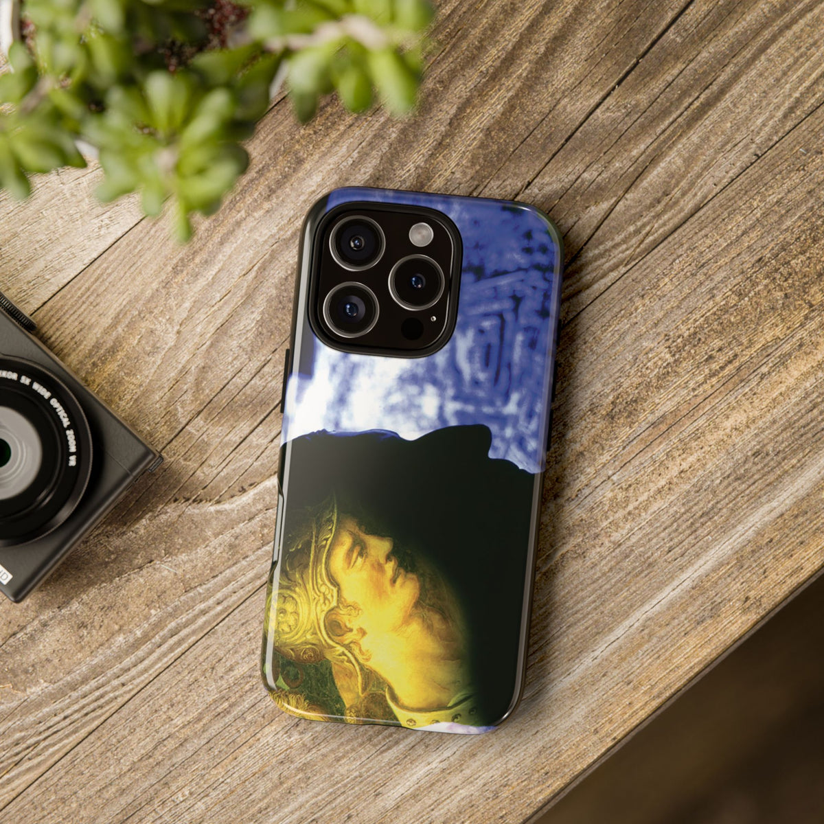 Attack on Rome tough phone case by Vittorio Storaro, from the La Civiltà Romana collection, shown on a table