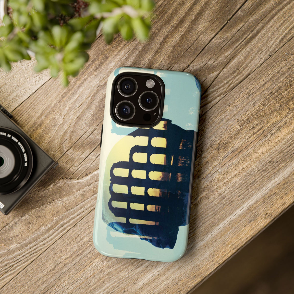 The Ages of Man tough phone case by Vittorio Storaro, from the La Civiltà Romana collection, shown on a table