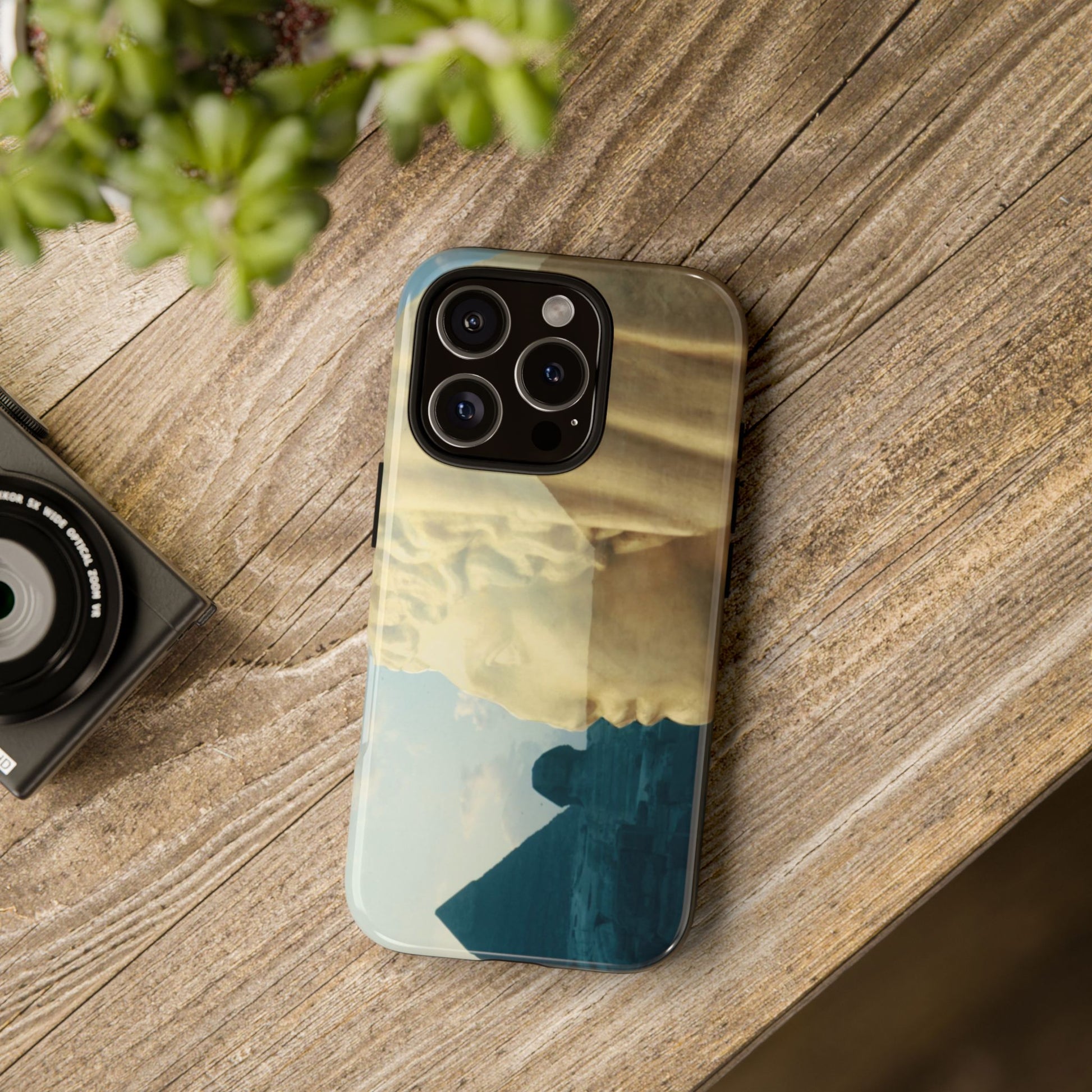 Land of Egypt tough phone case by Vittorio Storaro, from the La Civiltà Romana collection, shown on a table