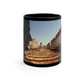 Trajan in the Colonnade of Apamea black mug by Storaro Art Collection - Roman emperor with Syrian colonnade architecture on sophisticated ceramic drinkware
